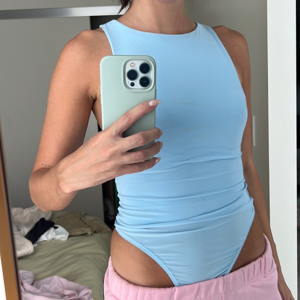 Neon light blue bodysuit top